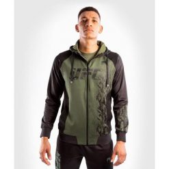 Bluza sportowa męska VENUM UFC Authentic Fight Week Zip. Czarne bluzy bez kaptura męskie UFC, bez wzorów, sportowe, bez kołnierzyka, bez ramiączek. Za 409.00 zł.