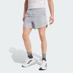 Szorty Run It. Szare szorty męskie Adidas, bez wzorów, z materiału, klasyczne. Za 139.00 zł.