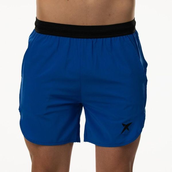 DROP SHOT AKER SS25 JON SANZ (Short). Niebieskie szorty męskie DROP SHOT, bez wzorów, z materiału. Za 193.55 zł.