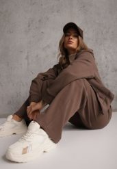 Brązowy Prążkowany Komplet Dresowy Spodnie o Szerokim Kroju i Bluza z Kapturem Rerih. Brązowe bluzy z kapturem damskie Renee, l, z dresówki. Za 169.99 zł.