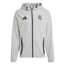 Kurtka przeciwdeszczowa z kapturem Real Madrid Competition Tiro 2024/25. Szare kurtki męskie Adidas, bez wzorów, sportowe, z kapturem. W wyprzedaży za 350.55 zł.