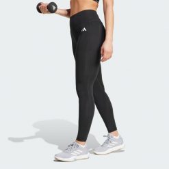 Długie legginsy Optimé Essentials Stash Pocket. Czarne legginsy damskie Adidas, s, bez wzorów, z elastanu. Za 199.00 zł.