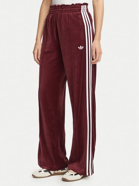 Adidas Spodnie dresowe Velour LG4291 Bordowy Loose Fit. Czerwone spodnie dresowe damskie Adidas, s, bez wzorów, z bawełny. Za 299.99 zł.