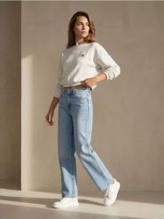Spodnie jeansowe wide straight leg z efektem sprania - niebieski. Niebieskie spodnie materiałowe damskie Sinsay, bez wzorów, z jeansu. Za 49.99 zł.