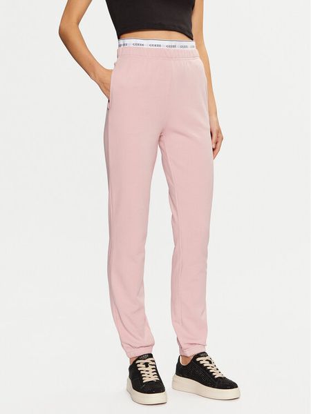 Guess Spodnie dresowe O5RB01 KCO31 Różowy Regular Fit. Czerwone spodnie dresowe damskie Guess, s, z aplikacjami, z bawełny. Za 139.99 zł.