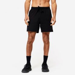 Spodenki fitness męskie Domyos 100. Czarne szorty męskie DOMYOS, l, z bawełny, na fitness i siłownię. Za 29.99 zł.