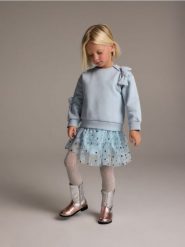 Bluza z kokardkami - jasnoniebieski. Niebieskie bluzy i bluzki niemowlęce Reserved, bez wzorów, z bawełny, bez ramiączek, bez kaptura. W wyprzedaży za 35.99 zł.