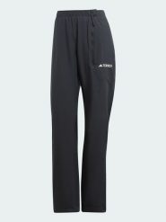Adidas Spodnie przeciwdeszczowe w kolorze czarnym rozmiar: 36. Czarne spodnie dresowe damskie Adidas, outdoorowe. Za 166.10 zł.