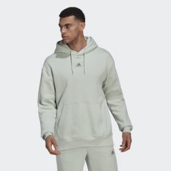 Bluza z polaru adidas Essentials FeelVivid. Zielone bluzy bez kaptura męskie Adidas, bez wzorów, z polaru, sportowe, bez kołnierzyka, bez ramiączek. W wyprzedaży za 212.25 zł.