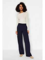 Trendyol Spodnie w kolorze granatowym rozmiar: 42. Niebieskie spodnie materiałowe damskie Trendyol, bez wzorów, z materiału, z podwyższonym stanem. Za 65.99 zł.