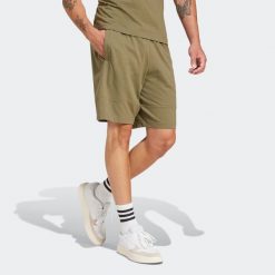 Spodenki fitness męskie ADIDAS. Zielone szorty męskie Adidas, m, z bawełny, na fitness i siłownię. Za 119.99 zł.