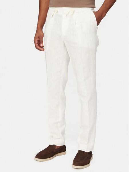 HUGO Spodnie materiałowe 50559695 Kremowy Regular Fit. Białe spodnie materiałowe męskie Hugo, bez wzorów, z bawełny. Za 649.99 zł.