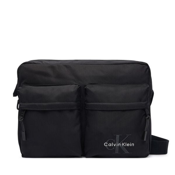 Saszetka Calvin Klein. Czarne saszetki męskie CALVIN KLEIN, bez wzorów. Za 369.99 zł.