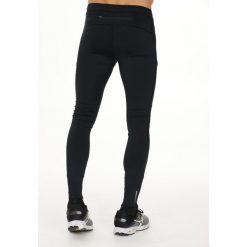 Wiatroszczelne legginsy Endurance Zane. Czarne spodnie dresowe męskie Endurance, bez wzorów, z dresówki. Za 182.50 zł.
