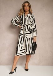 Czarna Sukienka z Wiskozą o Koszulowym Kroju w Geometryczny Print Ninatria. Czarne sukienki damskie Renee, na co dzień, l, bez wzorów, z wiskozy, eleganckie, bez kołnierzyka, bez ramiączek, midi, koszulowe. W wyprzedaży za 119.99 zł.
