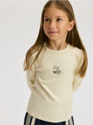 Koszulka z nadrukiem - beżowy. Brązowe koszulki dziewczęce Reserved, bez wzorów, z bawełny, bez ramiączek. Za 29.99 zł.