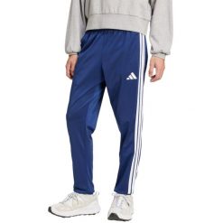 Spodnie męskie adidas 3-Stripes Tricot Regular Tapered. Białe spodnie sportowe męskie Adidas. Za 149.00 zł.