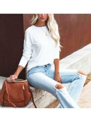 Milan Kiss Koszulka w kolorze białym rozmiar: L. Białe bluzki damskie Milan Kiss, l, bez wzorów, bez kołnierzyka, bez ramiączek. Za 122.67 zł.