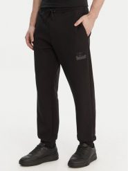 HUGO Spodnie dresowe Daylony 50557453 Czarny Regular Fit. Czarne spodnie dresowe męskie Hugo, bez wzorów, z bawełny. Za 519.99 zł.