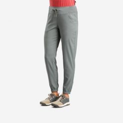 Spodnie turystyczne damskie Quechua NH100. Brązowe spodnie materiałowe damskie QUECHUA, bez wzorów, z materiału, sportowe. W wyprzedaży za 49.99 zł.