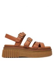 Clarks Sandały Evamar Strap 26185889 Brązowy. Brązowe sandały damskie Clarks, bez wzorów, ze skóry, bez obcasa, na płaskiej podeszwie. Za 519.99 zł.