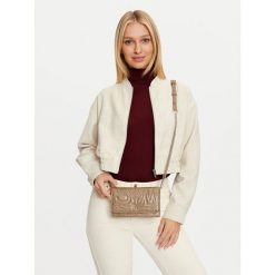 Torebka Steve Madden. Żółte torebki klasyczne damskie Steve Madden, bez wzorów, wizytowe, bez kołnierzyka, bez ramiączek. Za 389.99 zł.