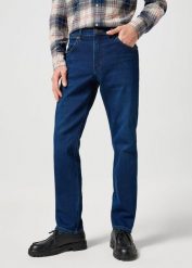 WRANGLER MĘSKIE SPODNIE JEANSOWE GREENSBORO SUNSET RINSE 112357414 W15Q008820. Spodnie materiałowe męskie Wrangler, bez wzorów, z jeansu. Za 229.99 zł.