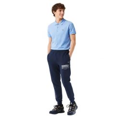 Spodnie turystyczne męskie Lacoste. Niebieskie spodnie sportowe męskie Lacoste, z dresówki. Za 327.00 zł.