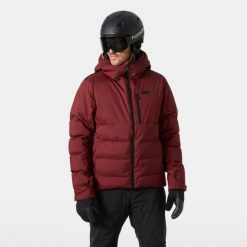 Kurtka puchowa Helly Hansen Kvitfjell. Czerwone kurtki męskie Helly Hansen, m, bez wzorów, z puchu, bez kaptura, narciarskie. W wyprzedaży za 1,313.50 zł.