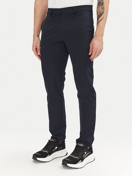 EA7 Emporio Armani Spodnie materiałowe 7M000509 AF14589 UB102 Granatowy Slim Fit. Niebieskie spodnie materiałowe męskie EA7 Emporio Armani, bez wzorów, z materiału, sportowe. Za 499.99 zł.