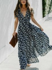 Milan Kiss Sukienka w kolorze czarnym ze wzorem rozmiar: S. Czarne sukienki damskie Milan Kiss, s, bez wzorów, z wiskozy, bez kołnierzyka, bez ramiączek, maxi. Za 148.96 zł.