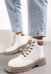 Białe Traperki Mocno Ocieplone Sztucznym Futerkiem Janeka. Białe trapery damskie Renee, z jeansu, bez obcasa, na płaskiej podeszwie. Za 79.99 zł.