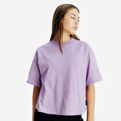 Koszulka Crop damska. Fioletowe t-shirty damskie Decathlon, l, bez wzorów, z bawełny, bez kołnierzyka. Za 54.99 zł.