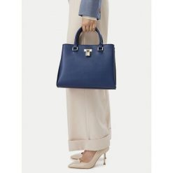 Torebka Nine West. Niebieskie torebki klasyczne damskie Nine West, bez wzorów, bez dodatków. Za 299.99 zł.
