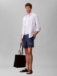 Calvin Klein Jeans szorty dresowe Mężczyźni niebieski, L. Niebieskie szorty męskie Calvin Klein Jeans, bez wzorów, z bawełny. Za 229.95 zł.