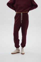 Spodnie typu jogger w kolorze BURGUNDY - COOL-XL. Czerwone spodnie materiałowe damskie Marsala, bez wzorów, z bawełny, eleganckie. Za 259.90 zł.