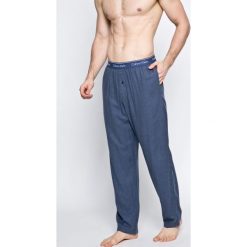 Calvin Klein Underwear - Spodnie piżamowe. Niebieskie piżamy męskie Calvin Klein Underwear, m, bez wzorów, z bawełny, bez ramiączek. W wyprzedaży za 129.90 zł.
