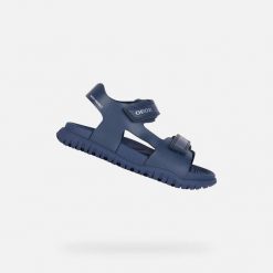 Sandały Geox Fusbetto. Niebieskie sandały męskie Geox, z gumy, bez zapięcia. Za 264.00 zł.