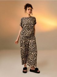 Wiskozowe spodnie wide leg - niebieski. Niebieskie spodnie materiałowe damskie Sinsay, bez wzorów, z wiskozy. Za 35.99 zł.