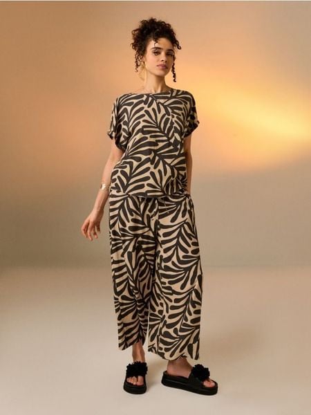 Wiskozowe spodnie wide leg - niebieski. Niebieskie spodnie materiałowe damskie Sinsay, bez wzorów, z wiskozy. Za 35.99 zł.