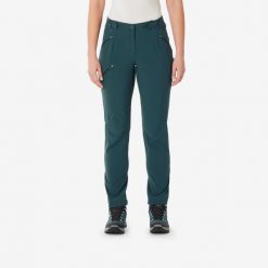 Spodnie turystyczne damskie Quechua MH500. Niebieskie spodnie materiałowe damskie QUECHUA, bez wzorów, z bawełny, sportowe. Za 149.99 zł.