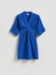 Muślinowa sukienka - niebieski. Niebieskie sukienki damskie Reserved, na co dzień, l, bez wzorów, z bawełny, bez kołnierzyka, bez ramiączek, proste. Za 159.99 zł.