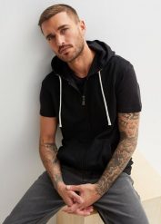 Kamizelka dresowa z kapturem z miękkiej mieszanki bawełny. Czarne kamizelki męskie bonprix, m, z bawełny. Za 109.99 zł.