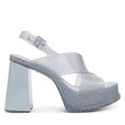 Sandały Melissa. Niebieskie sandały damskie Melissa, bez wzorów, bez obcasa, na słupku. Za 459.99 zł.