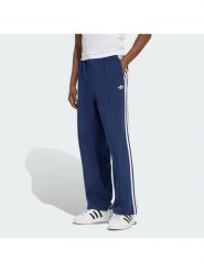 Adidas Spodnie dresowe adicolor Spacer Track KD4087 Granatowy Baggy Fit. Niebieskie spodnie dresowe męskie Adidas, bez wzorów, z bawełny. Za 349.99 zł.