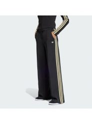 Adidas Spodnie materiałowe Sport Tailored KD2963 Czarny Wide Leg. Czarne spodnie materiałowe damskie Adidas, bez wzorów, z materiału, sportowe. Za 349.99 zł.