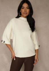 Jasnobeżowy Sweter z Cyrkoniami przy Rękawach Corentusa. Brązowe swetry klasyczne damskie Renee, m, z jeansu, bez kołnierzyka. Za 79.99 zł.