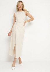 Jasnobeżowa Sukienka Dopasowana z Bawełną i Wiskozą z Rozcięciem Turilia. Brązowe sukienki damskie Born2be, na co dzień, m, bez wzorów, z bawełny, eleganckie, bez kołnierzyka, bez ramiączek, maxi, dopasowane. W wyprzedaży za 111.99 zł.