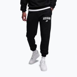 Spodnie męskie BOXRAW East Street Bottoms. Czarne spodnie materiałowe męskie BOXRAW, bez wzorów, z bawełny, eleganckie. Za 299.99 zł.