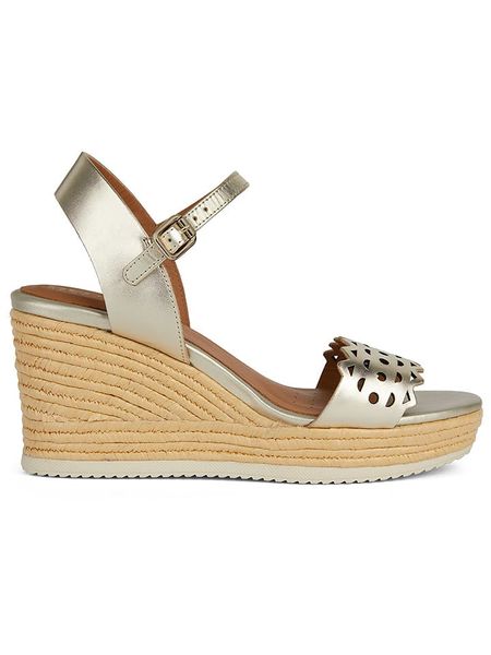 Geox Skórzane sandały "Ponza" w kolorze złotym na koturnie rozmiar: 38. Żółte sandały damskie Geox, bez wzorów, bez obcasa, na koturnie. Za 325.45 zł.